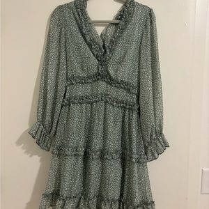 Green and white pattern dress.